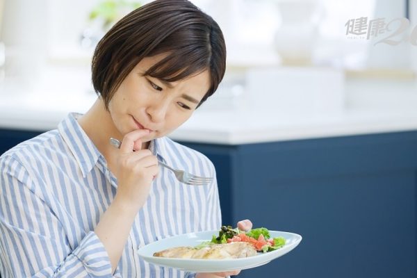 Asian,Woman,Worried,About,Eating